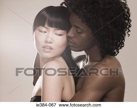 Intimate young couple View Large Photo Image Stock Photo - Intimate young couple. Fotosearch
