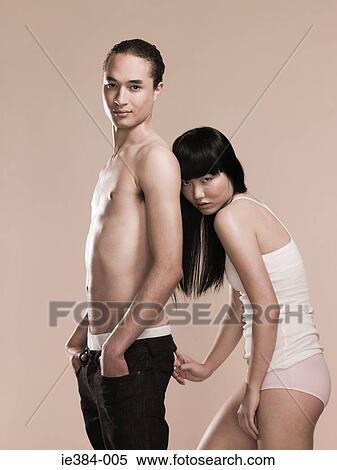 Sexy young couple View Large Photo Image Stock Photography - Sexy young couple. Fotosearch