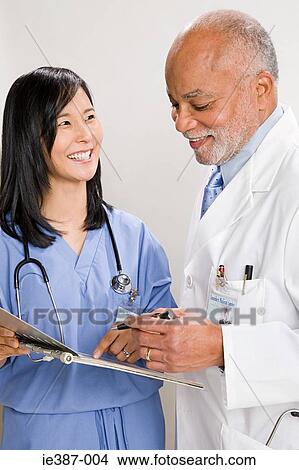 A doctor and nurse View Large Photo Image Picture - A doctor and nurse. Fotosearch