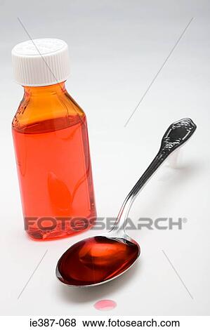 A medicine bottle and spoon View Large Photo Image Stock Photo - A medicine bottle and spoon. Fotosearch