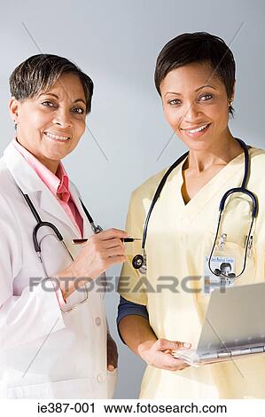 Portrait of a doctor and nurse View Large Photo Image Stock Image - Portrait of a doctor and nurse. Fotosearch
