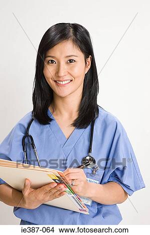 Portrait of a nurse View Large Photo Image Picture - Portrait of a nurse. Fotosearch