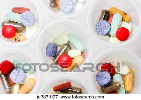 Tablets in containers View Large Photo Image Stock Photo - Tablets in containers. Fotosearch