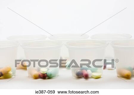 Tablets in containers View Large Photo Image Stock Photo - Tablets in containers. Fotosearch