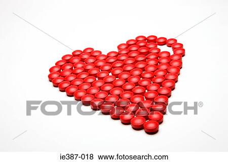 Tablets shaped into a heart View Large Photo Image Stock Photo - Tablets shaped into a heart. Fotosearch