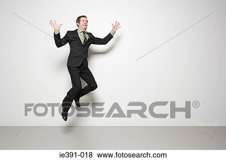 Businessman jumping View Large Photo Image Stock Photo - Businessman jumping. Fotosearch