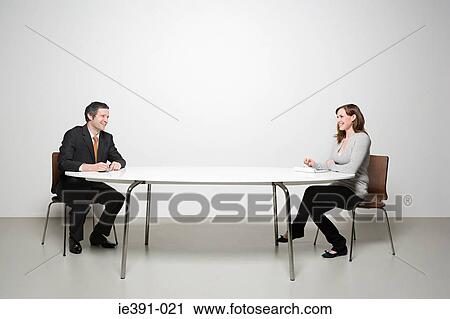 Stock Image - People having meeting. Fotosearch