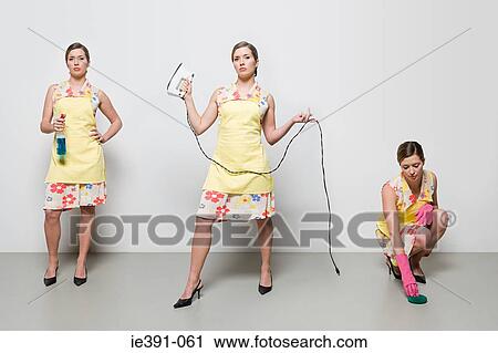 Woman doing housework View Large Photo Image Stock Image - Woman doing housework. Fotosearch