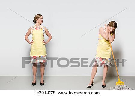 Woman with a mop View Large Photo Image Stock Photo - Woman with a mop. Fotosearch