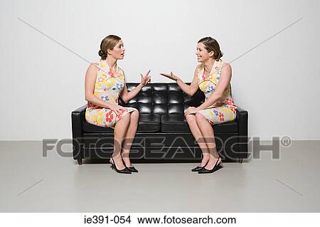 Picture - Women having conversation. Fotosearch