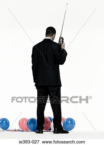 Man with walkie talkie View Large Photo Image Stock Photo - Man with walkie talkie. Fotosearch