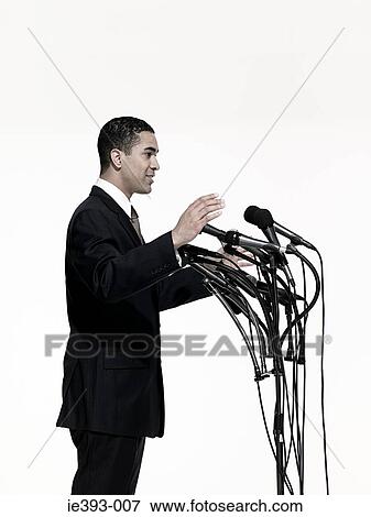 Stock Photo - Politician and microphones. Fotosearch