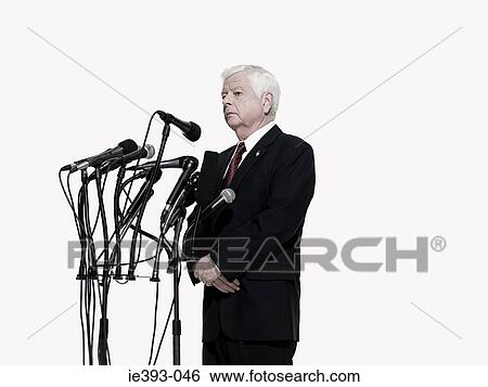 Stock Photograph - Politician and microphones. Fotosearch