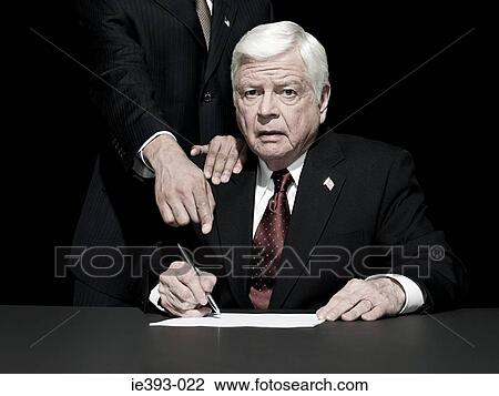 Politician being made to sign View Large Photo Image Stock Image - Politician being made to sign. Fotosearch