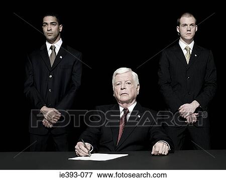 Politician signing paper View Large Photo Image Stock Photo - Politician signing paper. Fotosearch