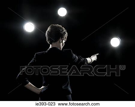 Stock Image - Politician under lights. Fotosearch
