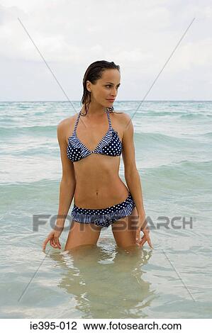 A young woman in the sea View Large Photo Image Stock Image - A young woman in the sea. Fotosearch