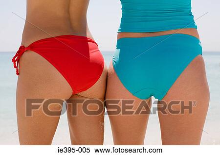 Rear view of two women View Large Photo Image Stock Photography - Rear view of two women. Fotosearch