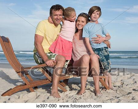 Family on a lounge chair View Large Photo Image Stock Image - Family on a lounge chair. Fotosearch