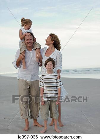 Family on the beach View Large Photo Image Stock Photograph - Family on the beach. Fotosearch