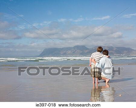 Father and son by the sea View Large Photo Image Stock Photo - Father and son by the sea. Fotosearch