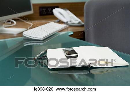 Cellular phone and notepad View Large Photo Image Stock Image - Cellular phone and notepad. Fotosearch