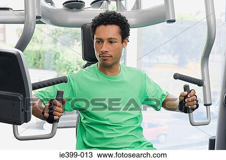 Man at the gym View Large Photo Image Stock Image - Man at the gym. Fotosearch