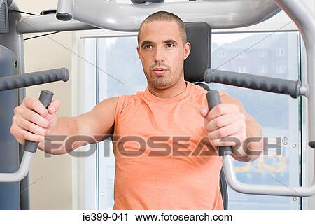 Stock Image - Man at the gym. Fotosearch