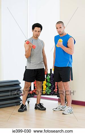 Men with dumbbells View Large Photo Image Stock Image - Men with dumbbells. Fotosearch