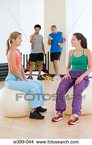 Picture - People in exercise studio. Fotosearch