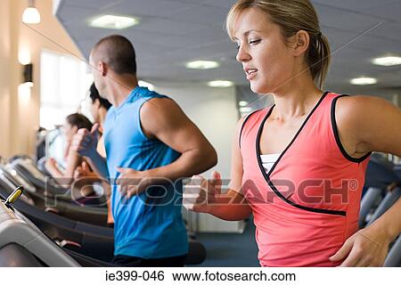 People on treadmills View Large Photo Image Stock Photograph - People on treadmills. Fotosearch