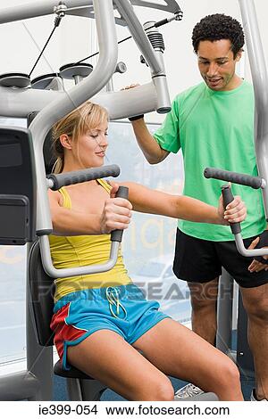 Woman and fitness instructor View Large Photo Image Picture - Woman and fitness instructor. Fotosearch