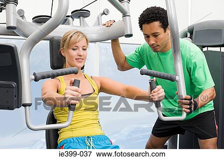 Woman and fitness instructor View Large Photo Image Stock Photo - Woman and fitness instructor. Fotosearch