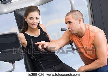 Woman and fitness instructor View Large Photo Image Stock Photograph - Woman and fitness instructor. Fotosearch