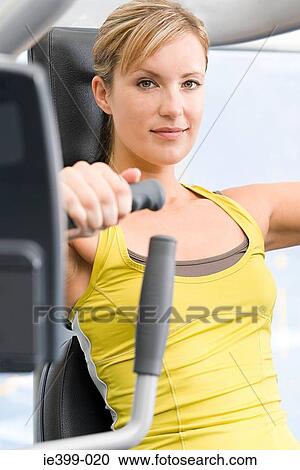 Woman at the gym View Large Photo Image Stock Image - Woman at the gym. Fotosearch