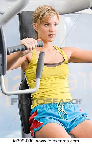Woman at the gym View Large Photo Image Stock Image - Woman at the gym. Fotosearch