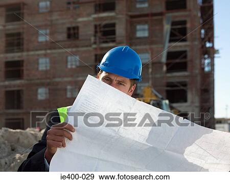 Architect on building site View Large Photo Image Stock Photo - Architect on building site. Fotosearch