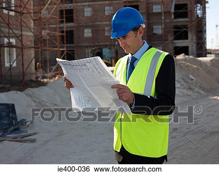 Architect on building site View Large Photo Image Stock Photograph - Architect on building site. Fotosearch