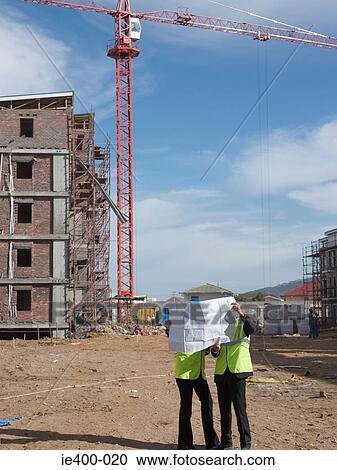 Architects on building site View Large Photo Image Stock Image - Architects on building site. Fotosearch