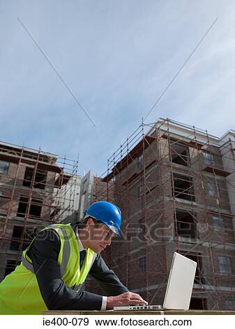 Engineer on building site View Large Photo Image Stock Photo - Engineer on building site. Fotosearch