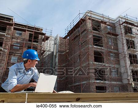Engineer on building site View Large Photo Image Stock Photography - Engineer on building site. Fotosearch