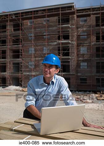 Engineer on building site View Large Photo Image Stock Photography - Engineer on building site. Fotosearch