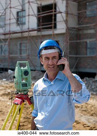 Engineer with walkie talkie View Large Photo Image Picture - Engineer with walkie talkie. Fotosearch
