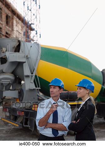Engineers by cement mixer View Large Photo Image Stock Image - Engineers by cement mixer. Fotosearch