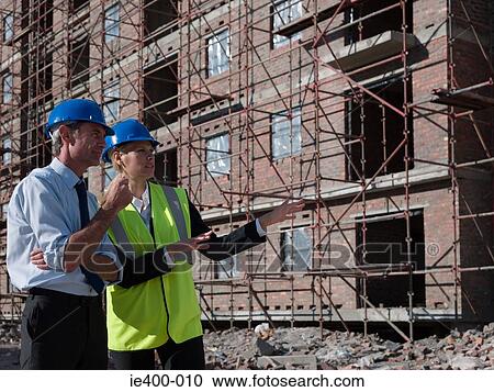 Engineers on building site View Large Photo Image Stock Image - Engineers on building site. Fotosearch