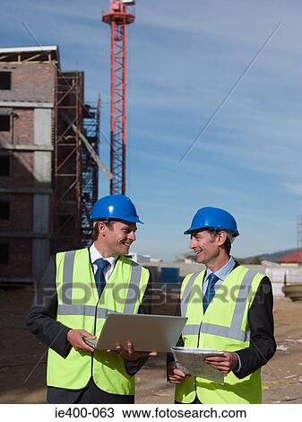 Engineers on building site View Large Photo Image Stock Image - Engineers on building site. Fotosearch