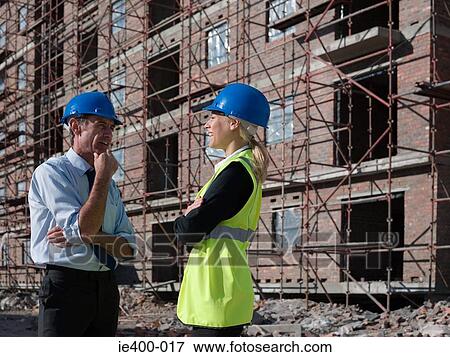 Engineers on building site View Large Photo Image Stock Photo - Engineers on building site. Fotosearch