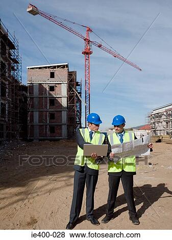 Engineers on building site View Large Photo Image Stock Photo - Engineers on building site. Fotosearch