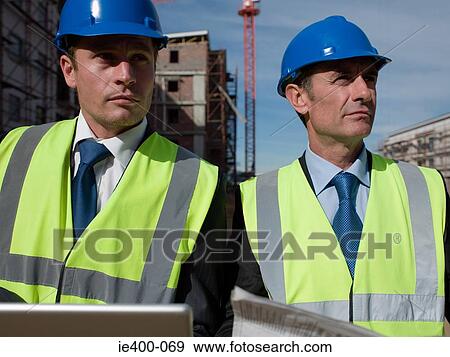 Stock Photo - Engineers on building site. Fotosearch