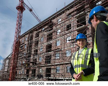Engineers on building site View Large Photo Image Stock Photography - Engineers on building site. Fotosearch